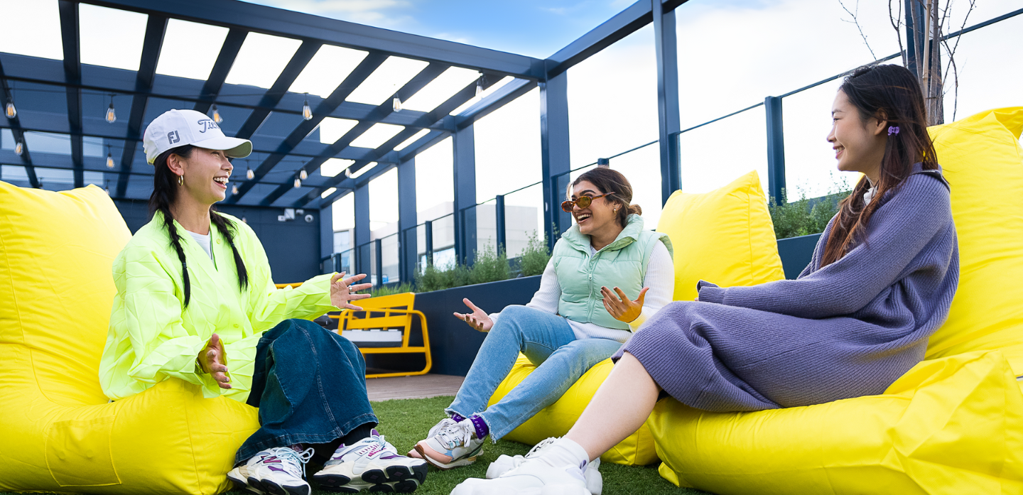 Students sit in bean bags on the rooftop area at Scape Leicester