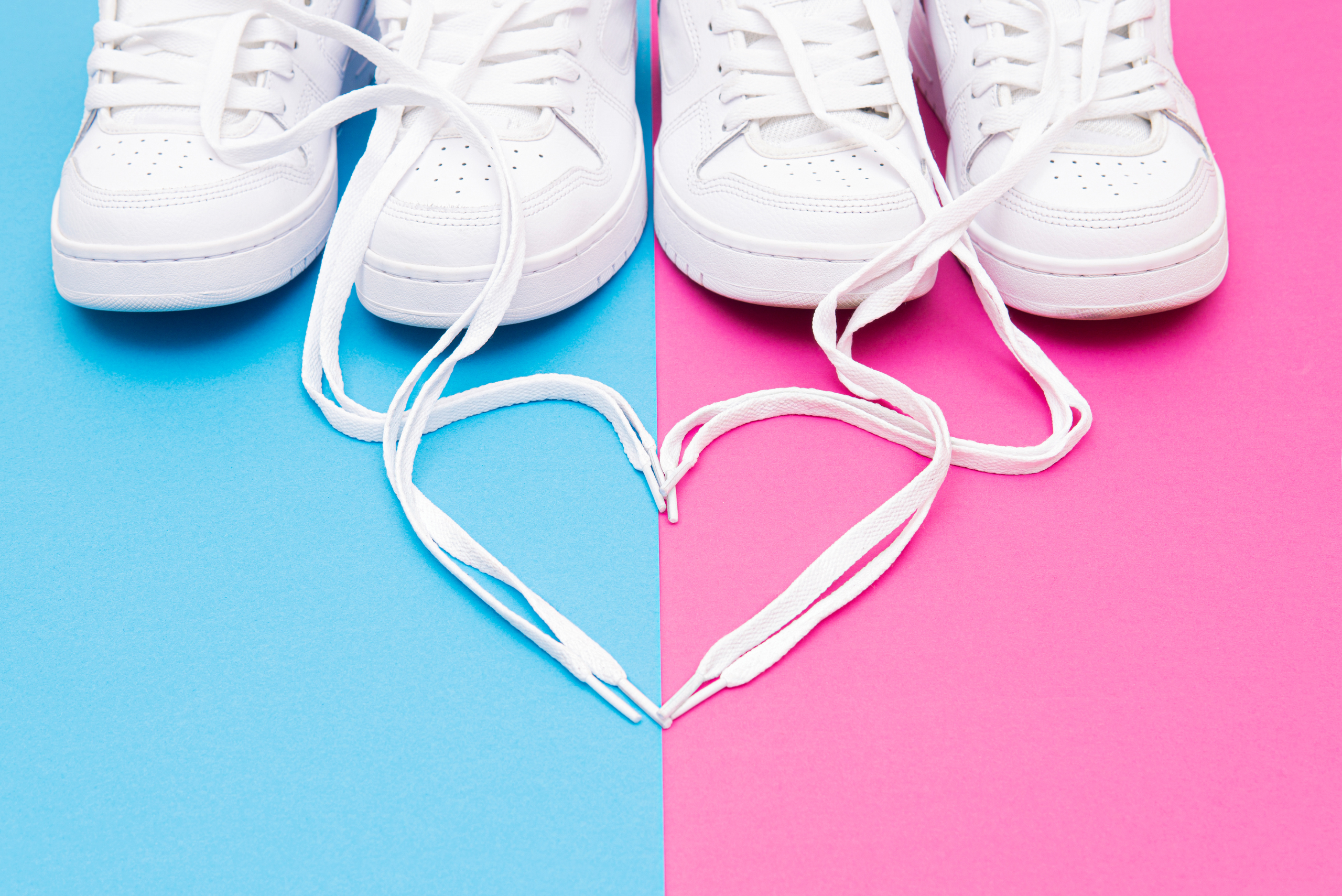 sneakers with shoe laces making a heart