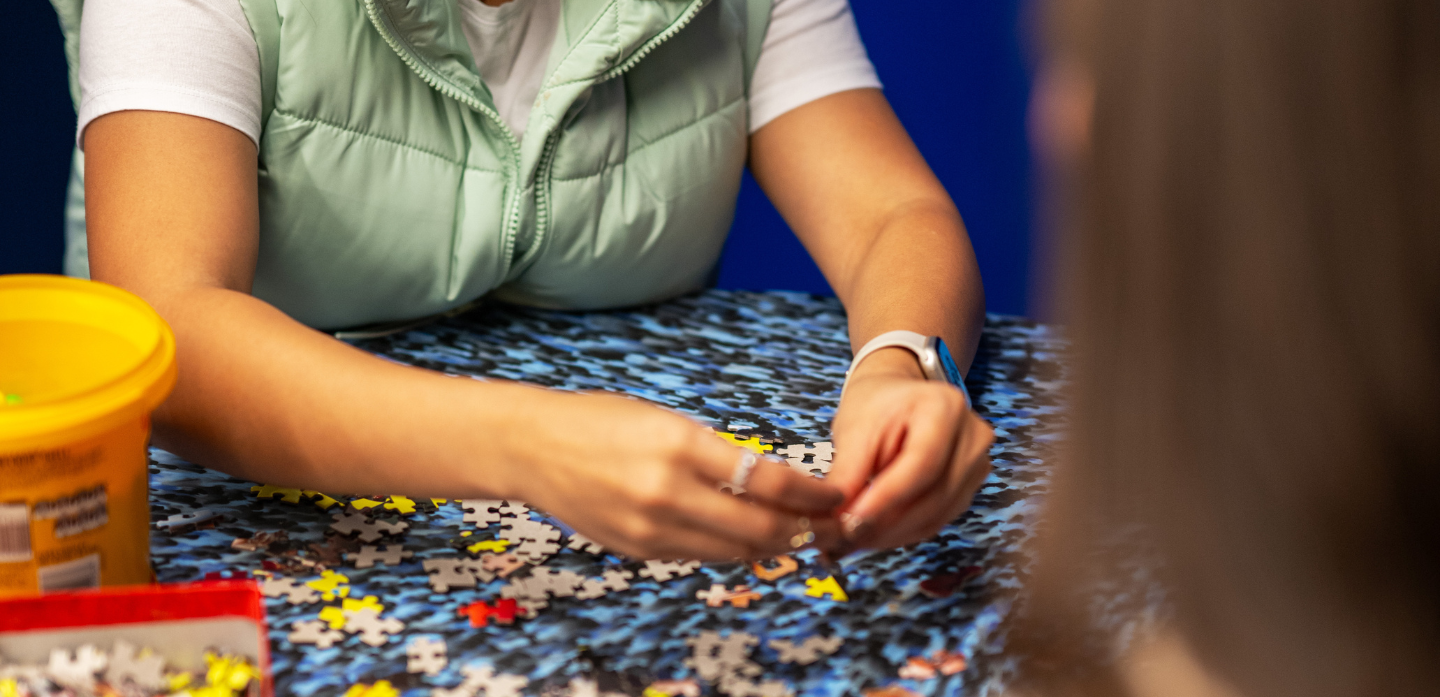 Puzzle playing in the games room at Scape Leicester