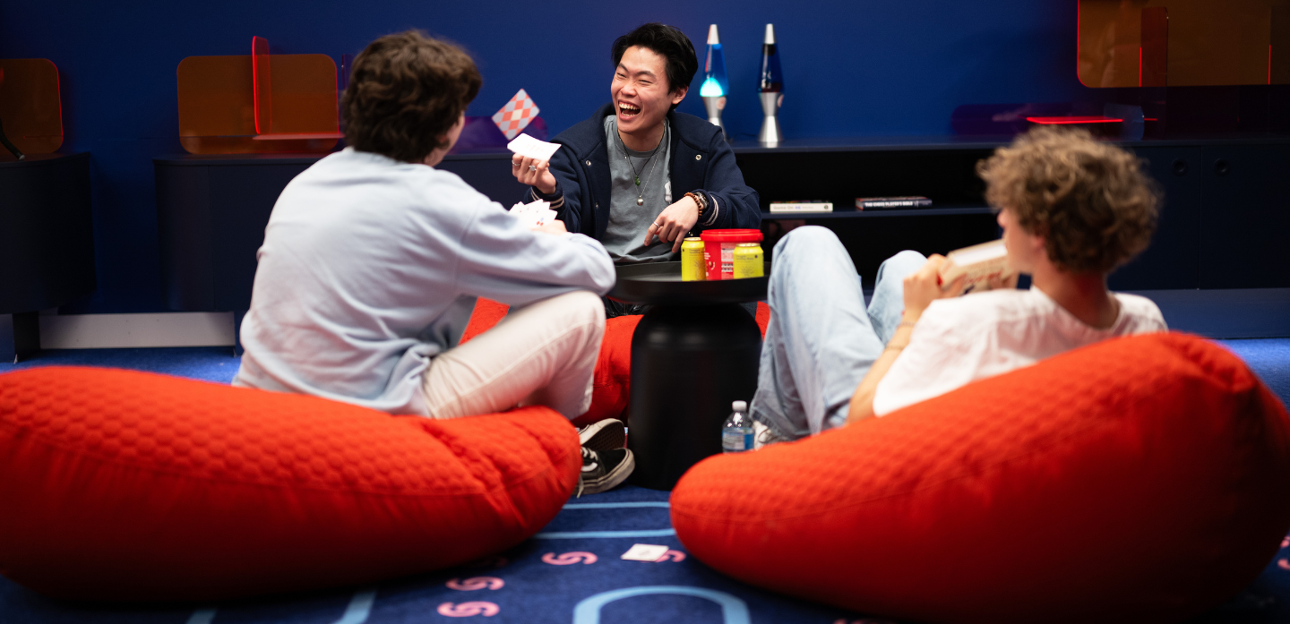 Students in the gaming lounge at Scape Leicester
