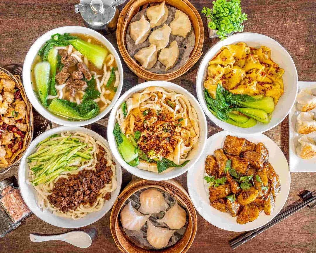 A table full of Chinese cheap eats.